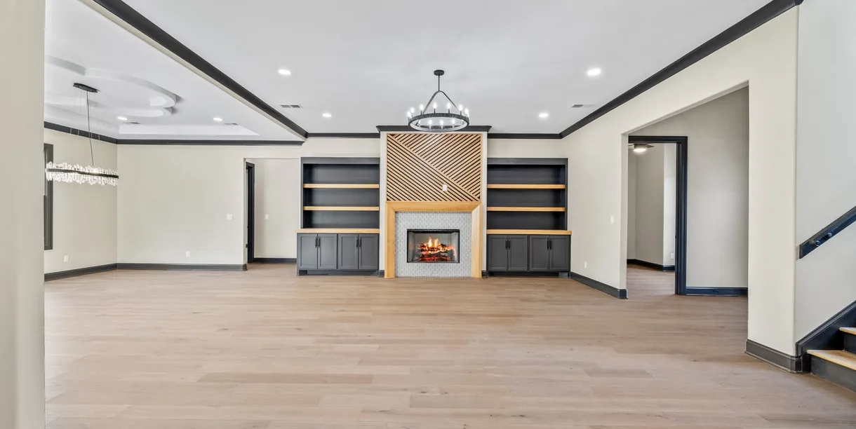 An open kitchen and living space in a finished home